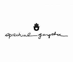 Logo featuring the phrase "spiritual gangster" in cursive handwriting with a graphic of a hand above the text.